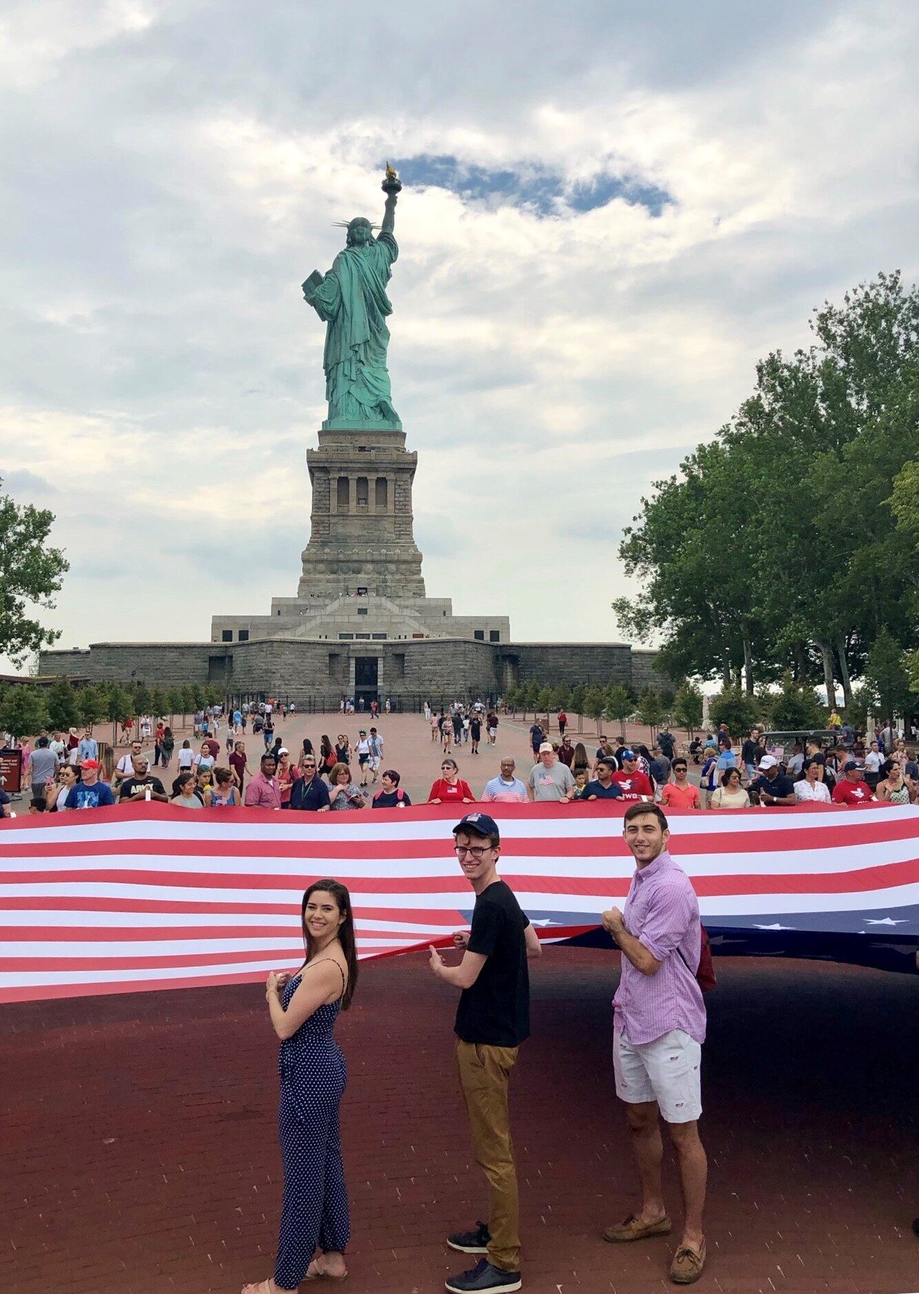 flag ceremony at the statue of liberty